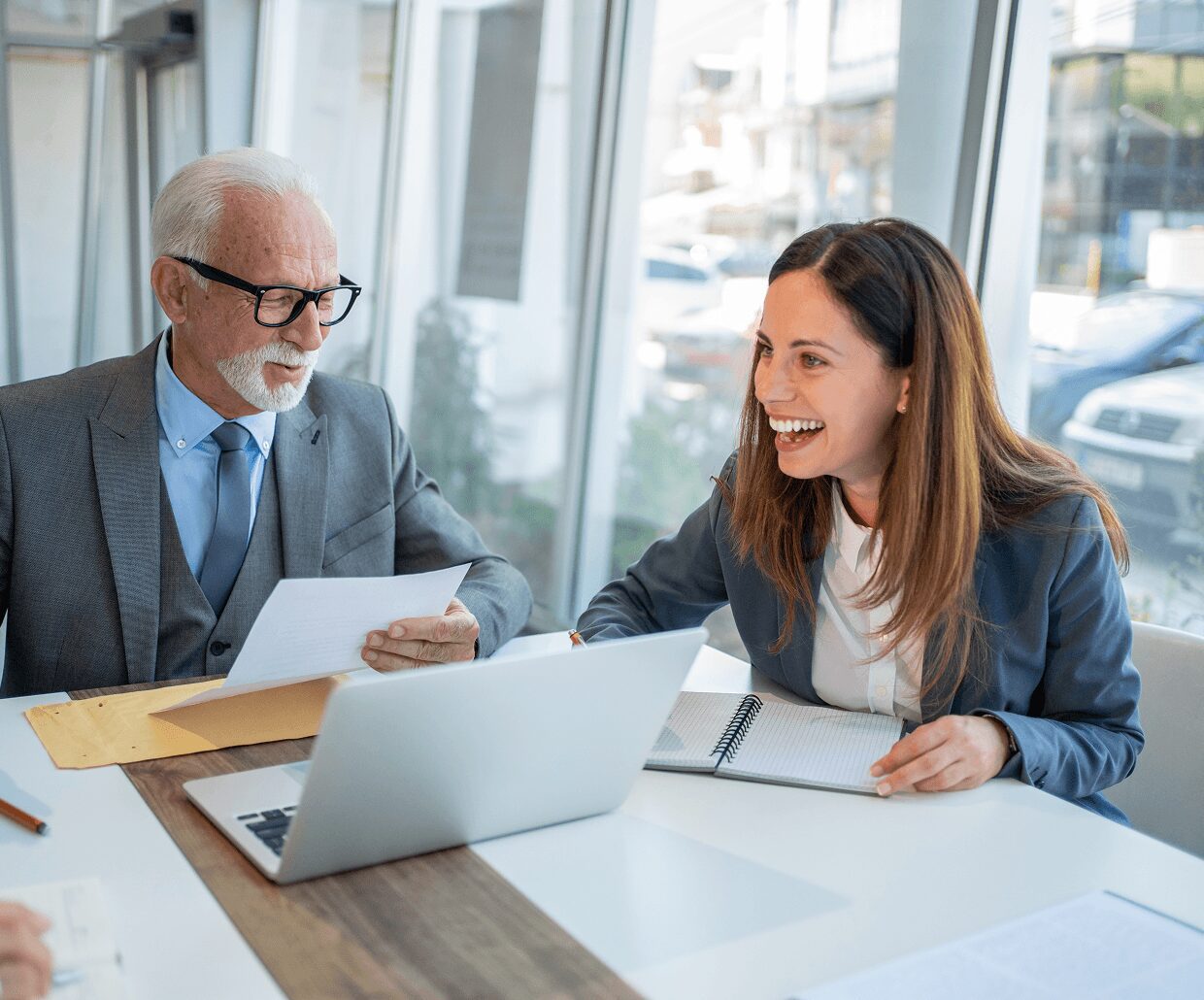 Man and woman collaborating in meeting