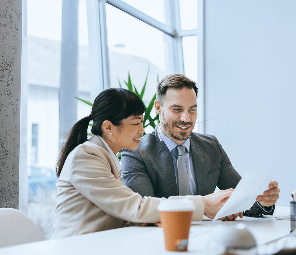 Office teamwork discussion over a document